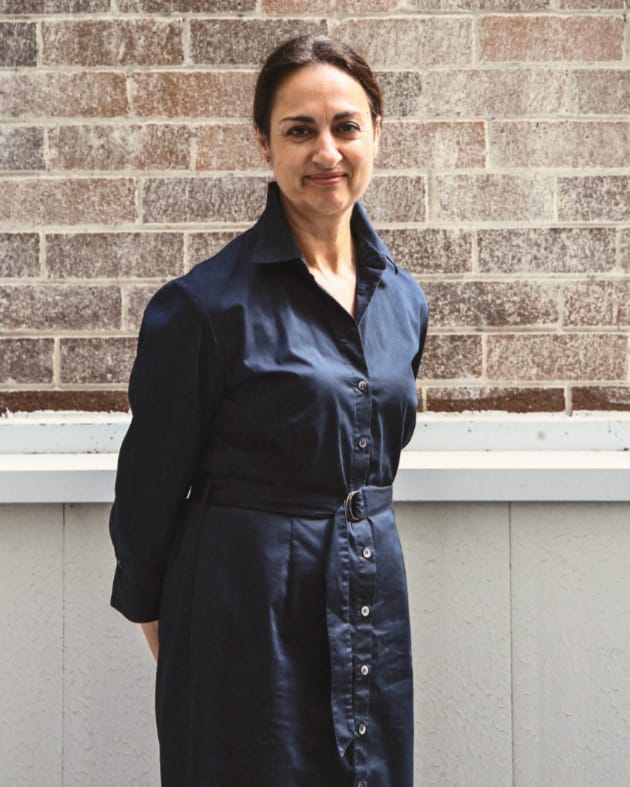 cost manager in blue dress